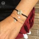 Bracelet croix arrondie en nacre et son fil doré - Taille réglable - Bracelets religieux femme Godsavetheking
